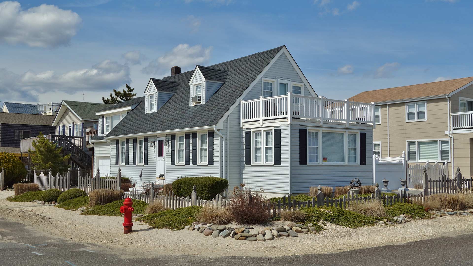 home with second floor deck on street corner near beach barnegat nj